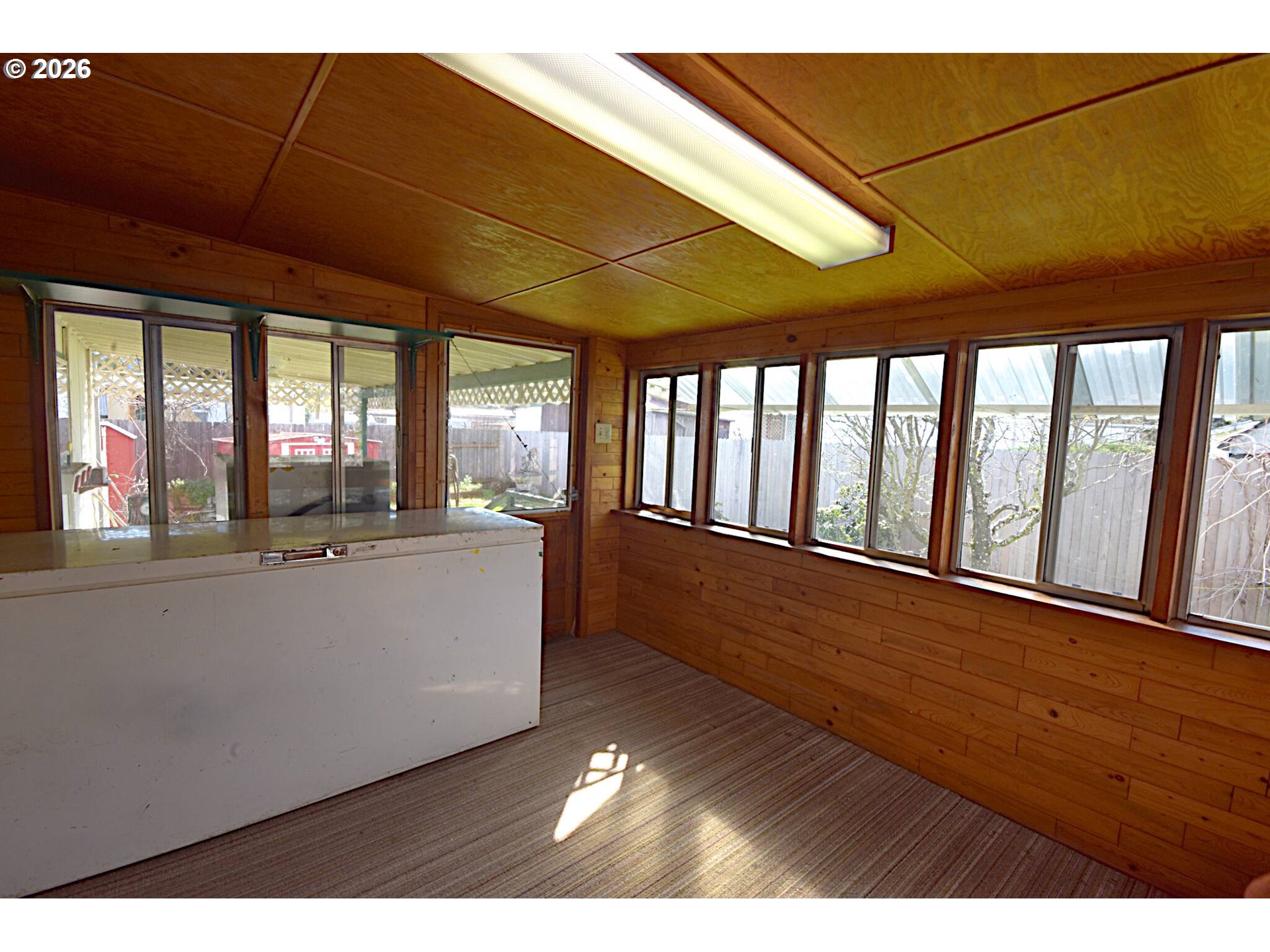 569 South 51st Place Springfield, OR 97478 - Photo 22 of 40 a living room with a large window