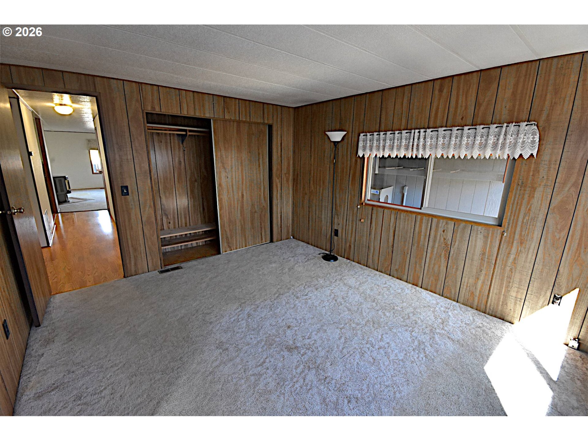 569 South 51st Place Springfield, OR 97478 - Photo 9 of 40 a view of a livingroom from a hallway
