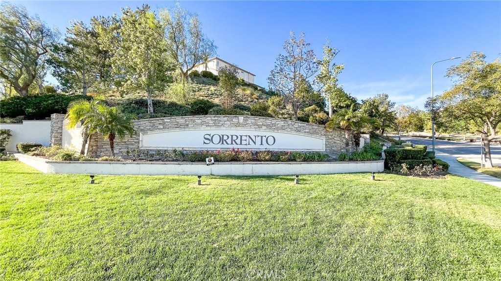 20751 Lugano Way Porter Ranch, CA 91326 - Photo 1 of 25 a swimming pool with outdoor seating and yard