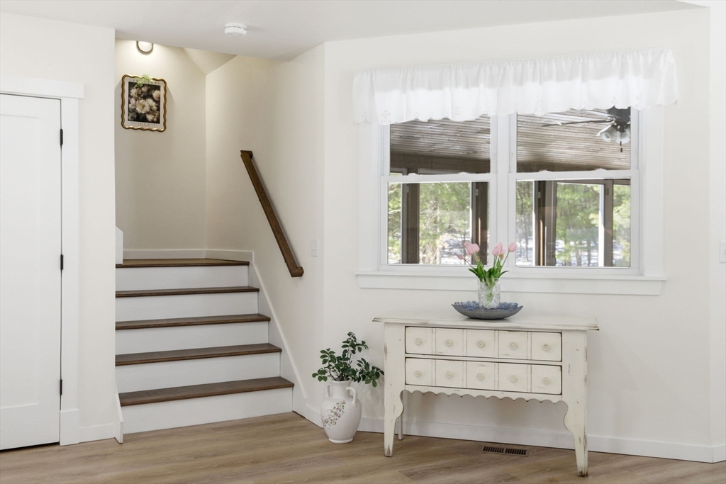 7 Crane Landing Road Wareham, MA 02571 - Photo 11 of 40 a view of front door with wooden floor and windows