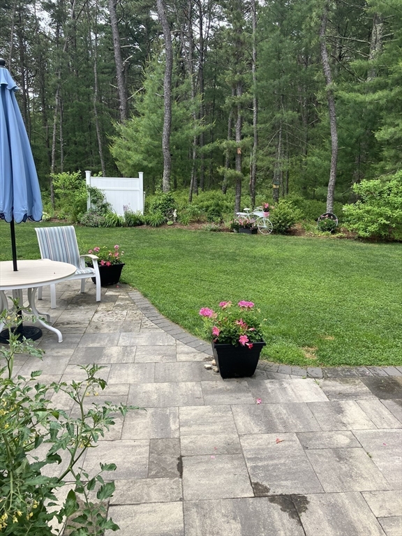 7 Crane Landing Road Wareham, MA 02571 - Photo 27 of 40 a view of a garden with patio