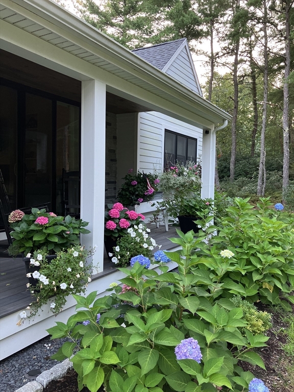 7 Crane Landing Road Wareham, MA 02571 - Photo 28 of 40 a house view with a garden space