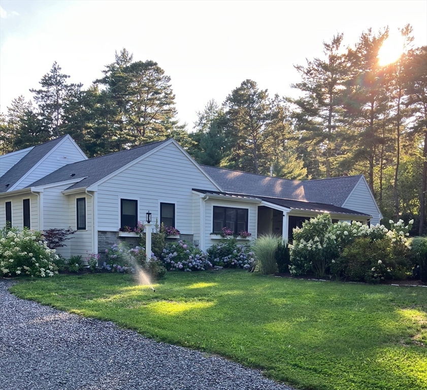 7 Crane Landing Road Wareham, MA 02571 - Photo 32 of 40 a front view of house with yard and green space