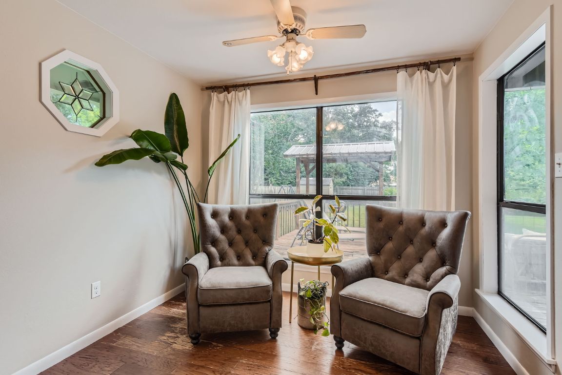 13223 Broadmeade Avenue Austin, TX 78729 - Photo 15 of 39 a living room with furniture and a window