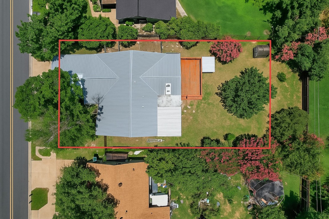 13223 Broadmeade Avenue Austin, TX 78729 - Photo 31 of 39 an aerial view of a house with a yard and lake view