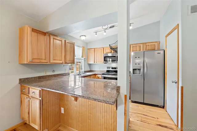 $460,000 | 4557 South Laredo Street, Aurora, CO 80015