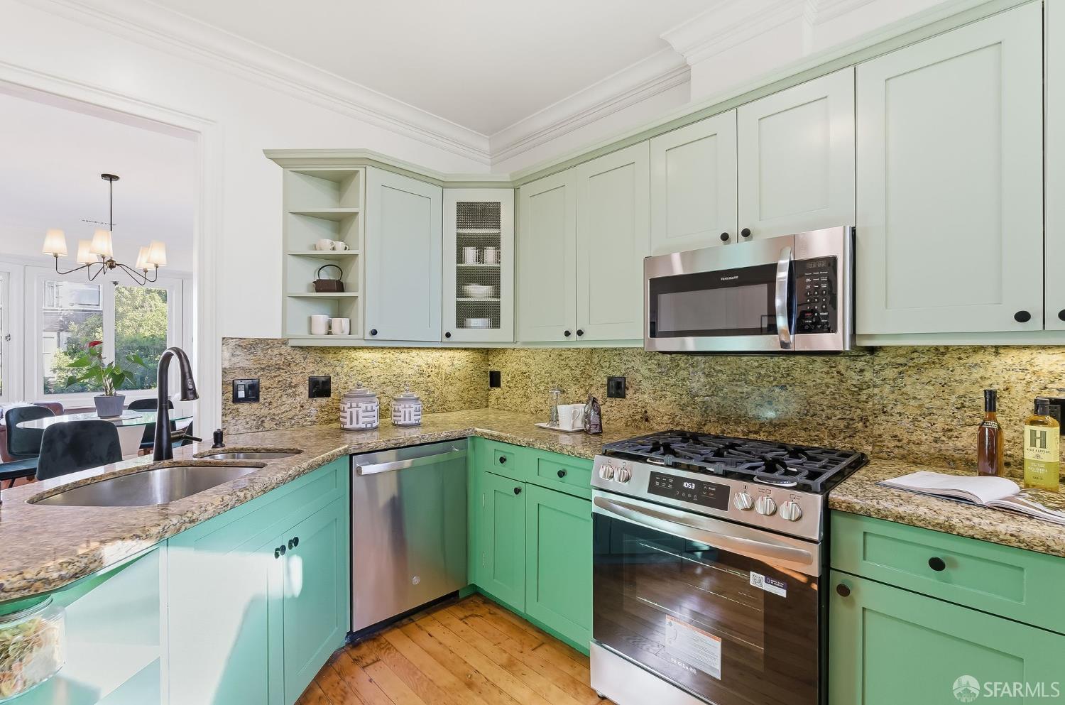 717 Page Street San Francisco, CA 94117 - Photo 11 of 39 a kitchen with stainless steel appliances granite countertop a sink stove and cabinets
