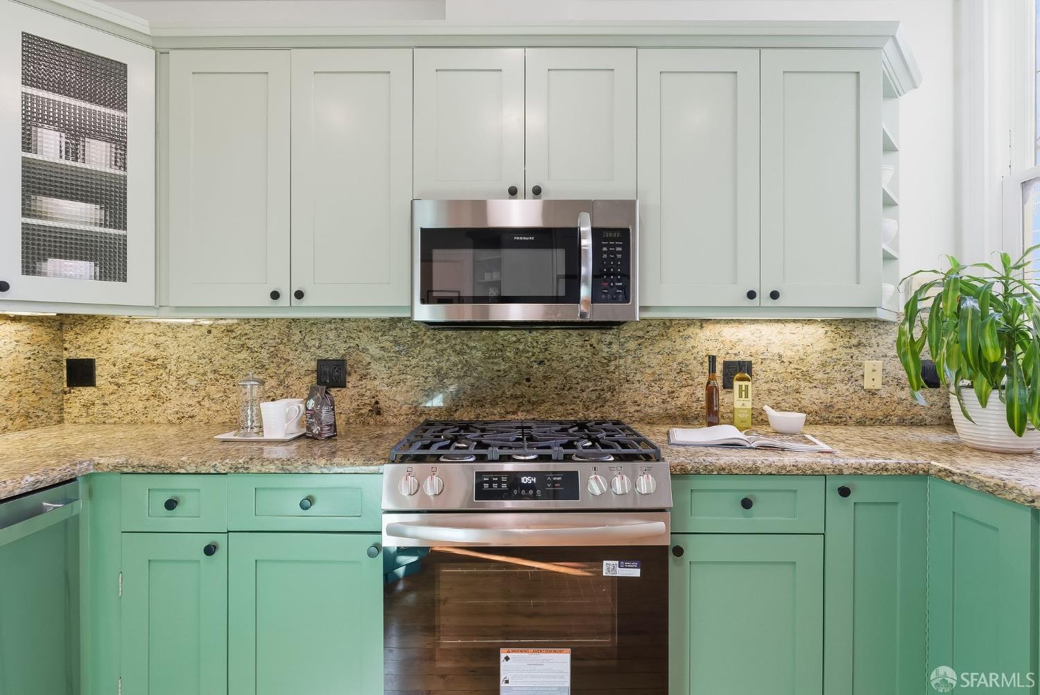 717 Page Street San Francisco, CA 94117 - Photo 13 of 39 a kitchen with sink a stove and cabinets