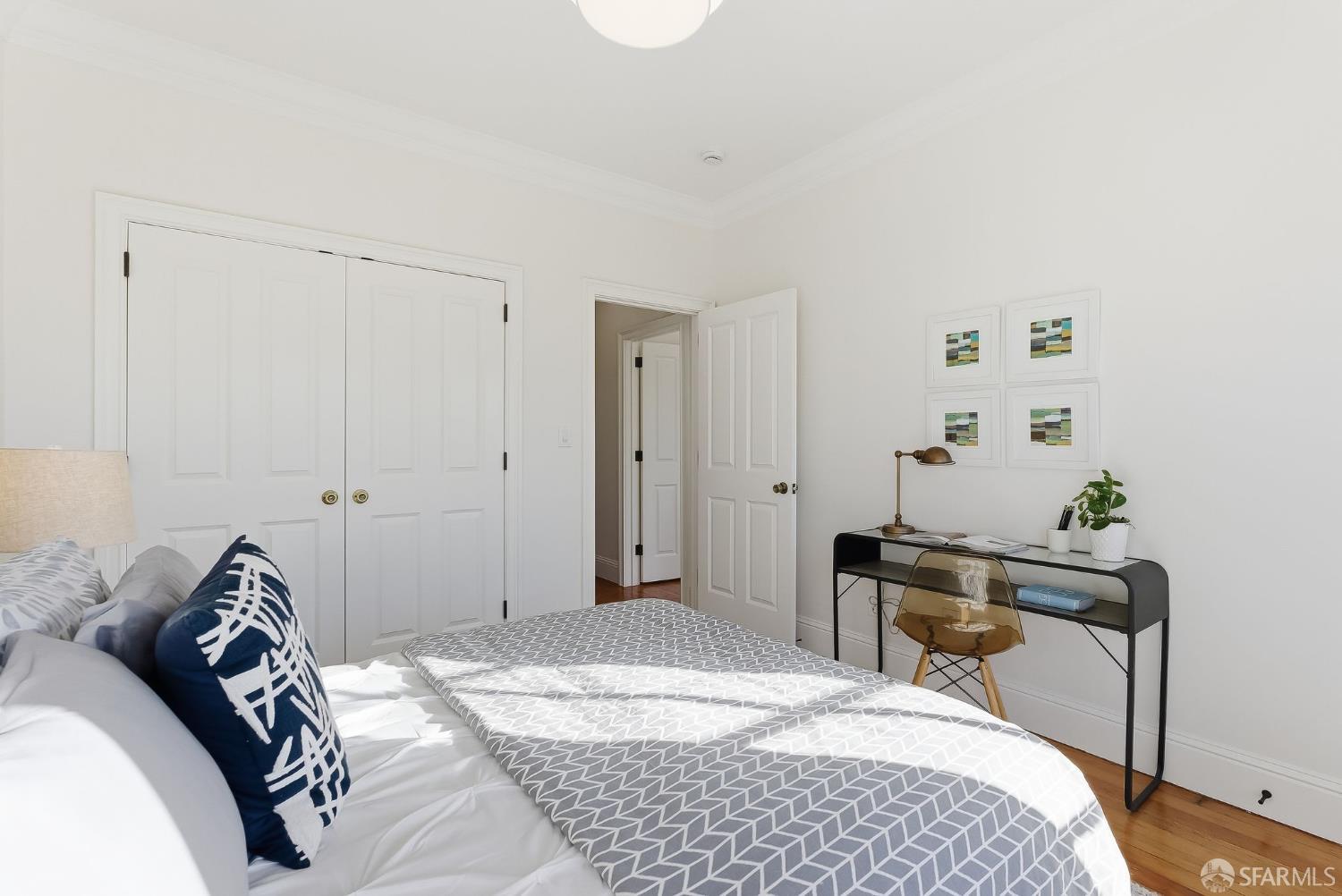 717 Page Street San Francisco, CA 94117 - Photo 15 of 39 a bedroom with a bed and a closet