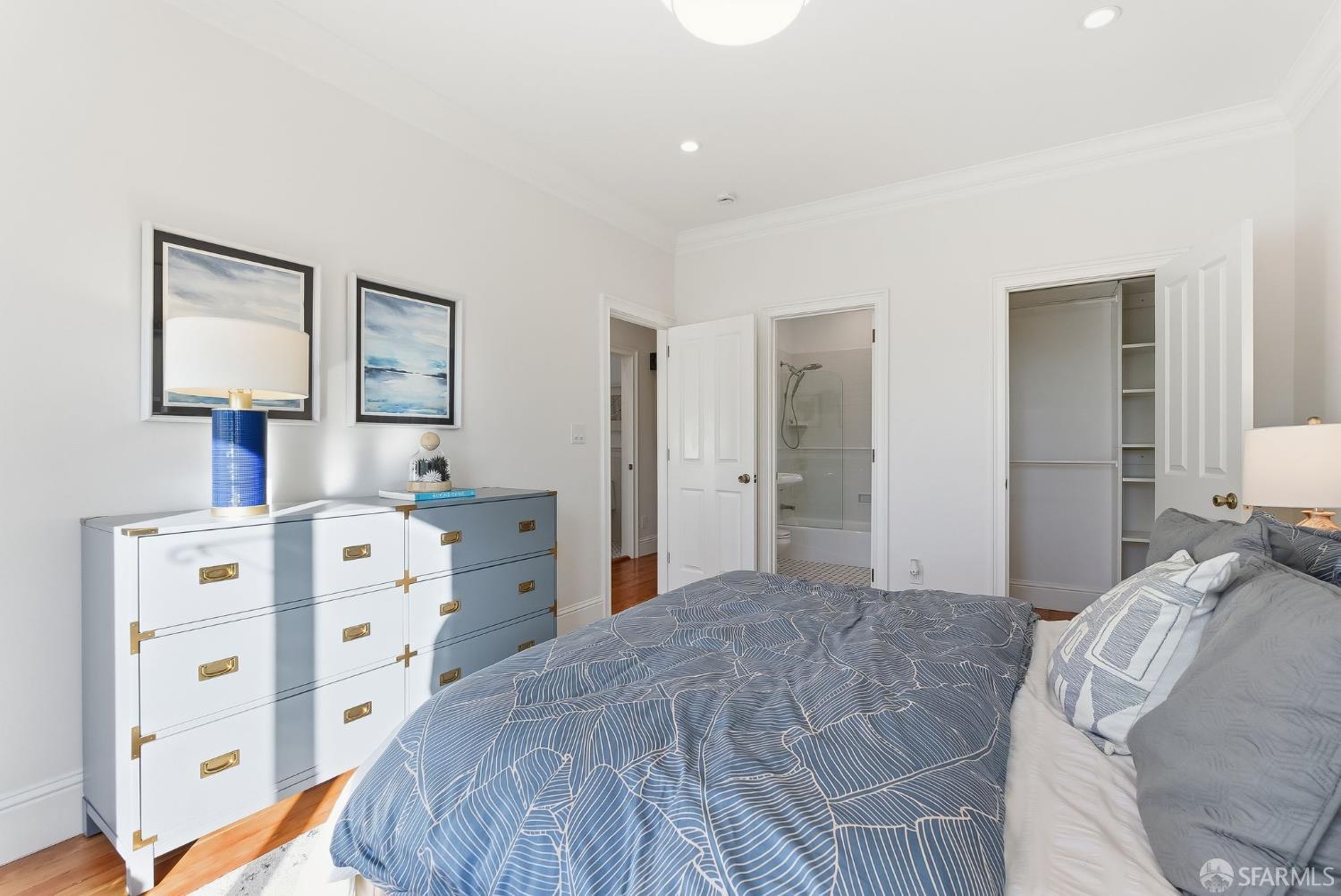 717 Page Street San Francisco, CA 94117 - Photo 17 of 39 a bedroom with a bed and dresser