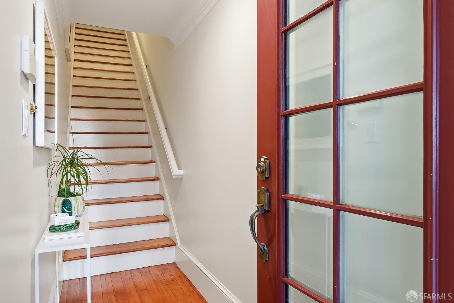717 Page Street San Francisco, CA 94117 - Photo 25 of 39 a view of entryway with wooden floor