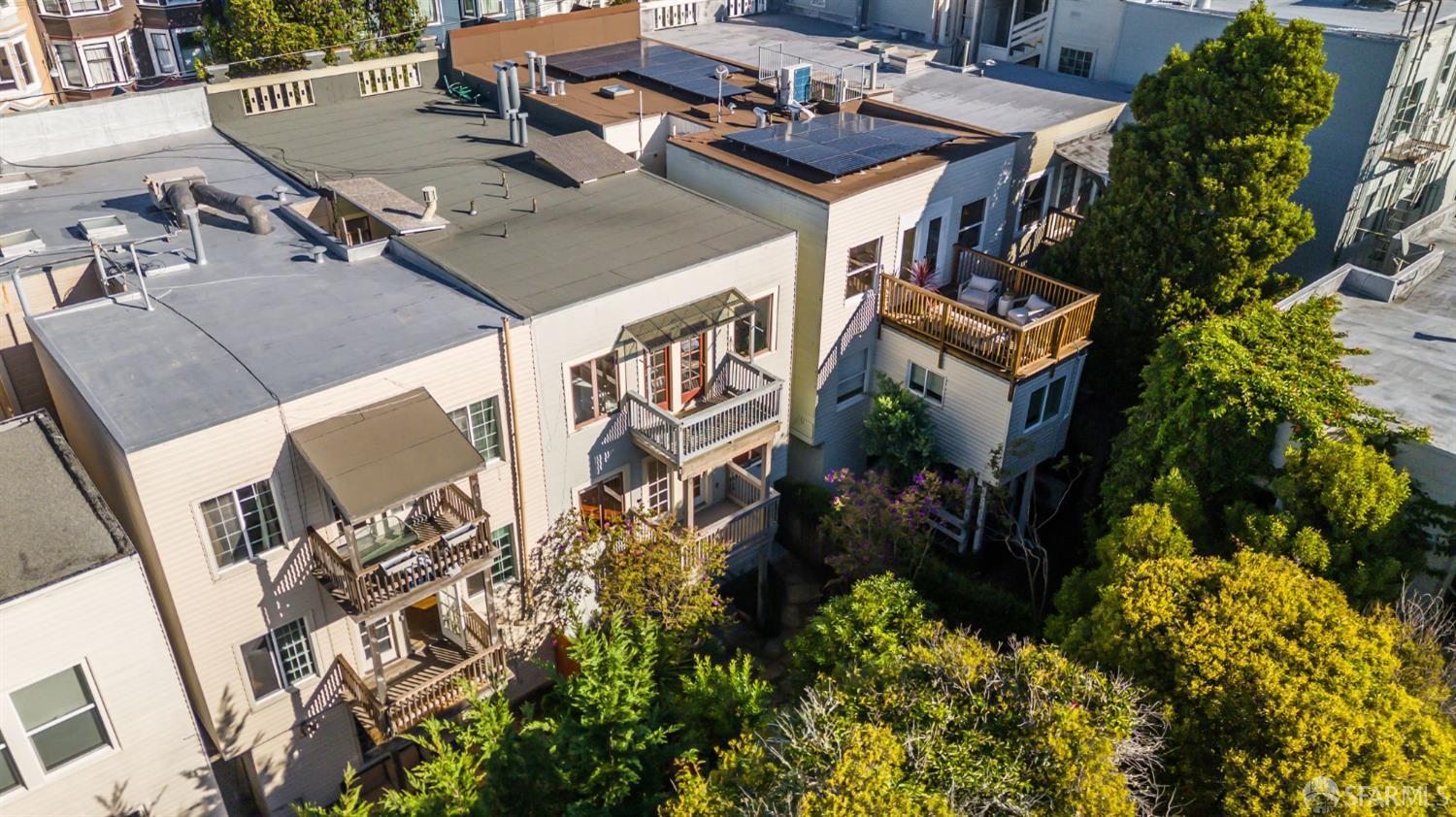 717 Page Street San Francisco, CA 94117 - Photo 36 of 39 an aerial view of a house with a yard and garden