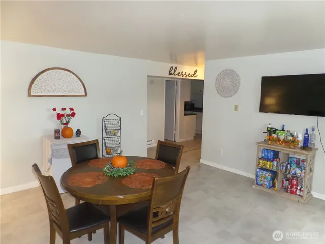 a kitchen with sink and cabinets
