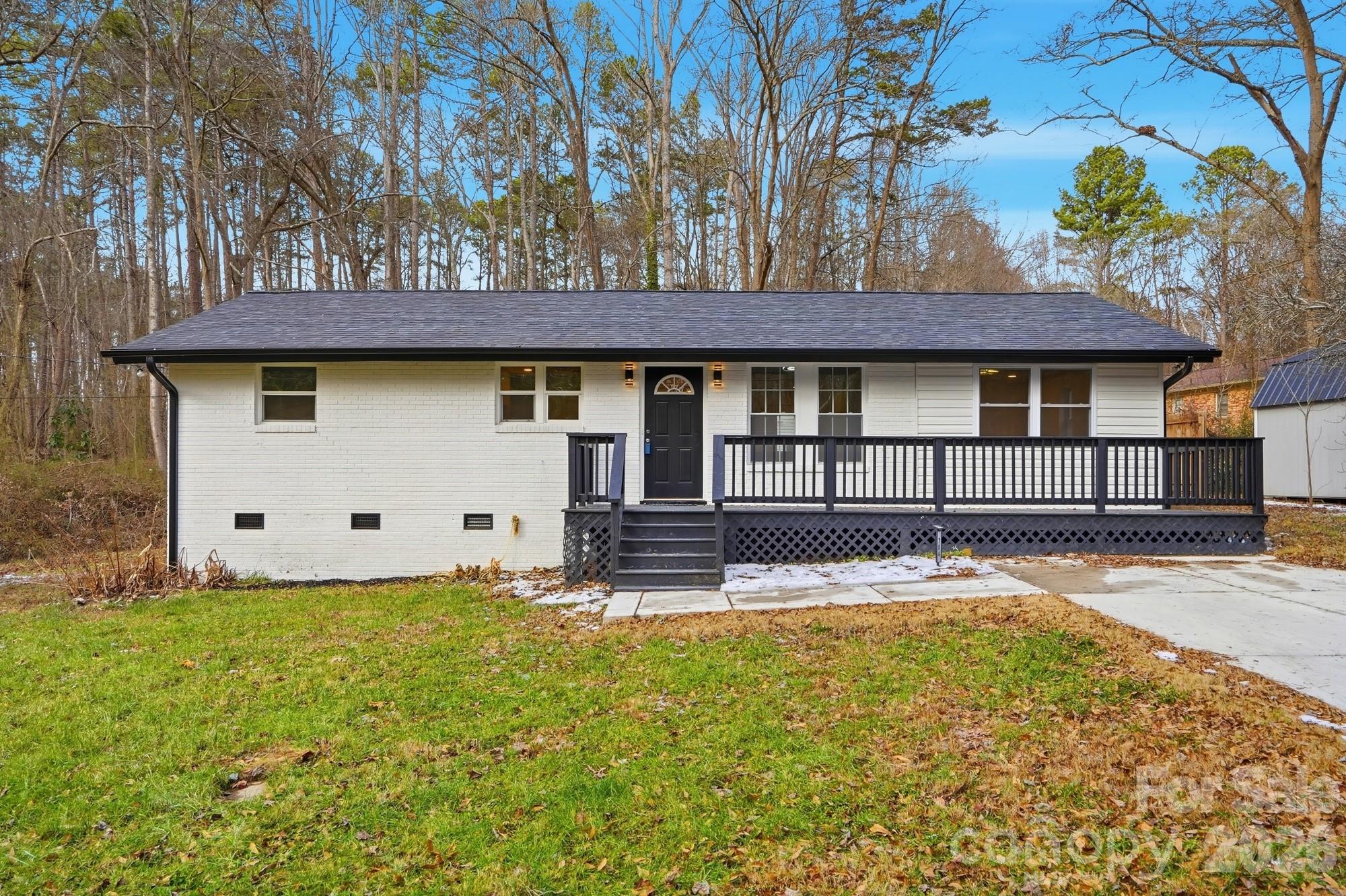 a house view with a garden space