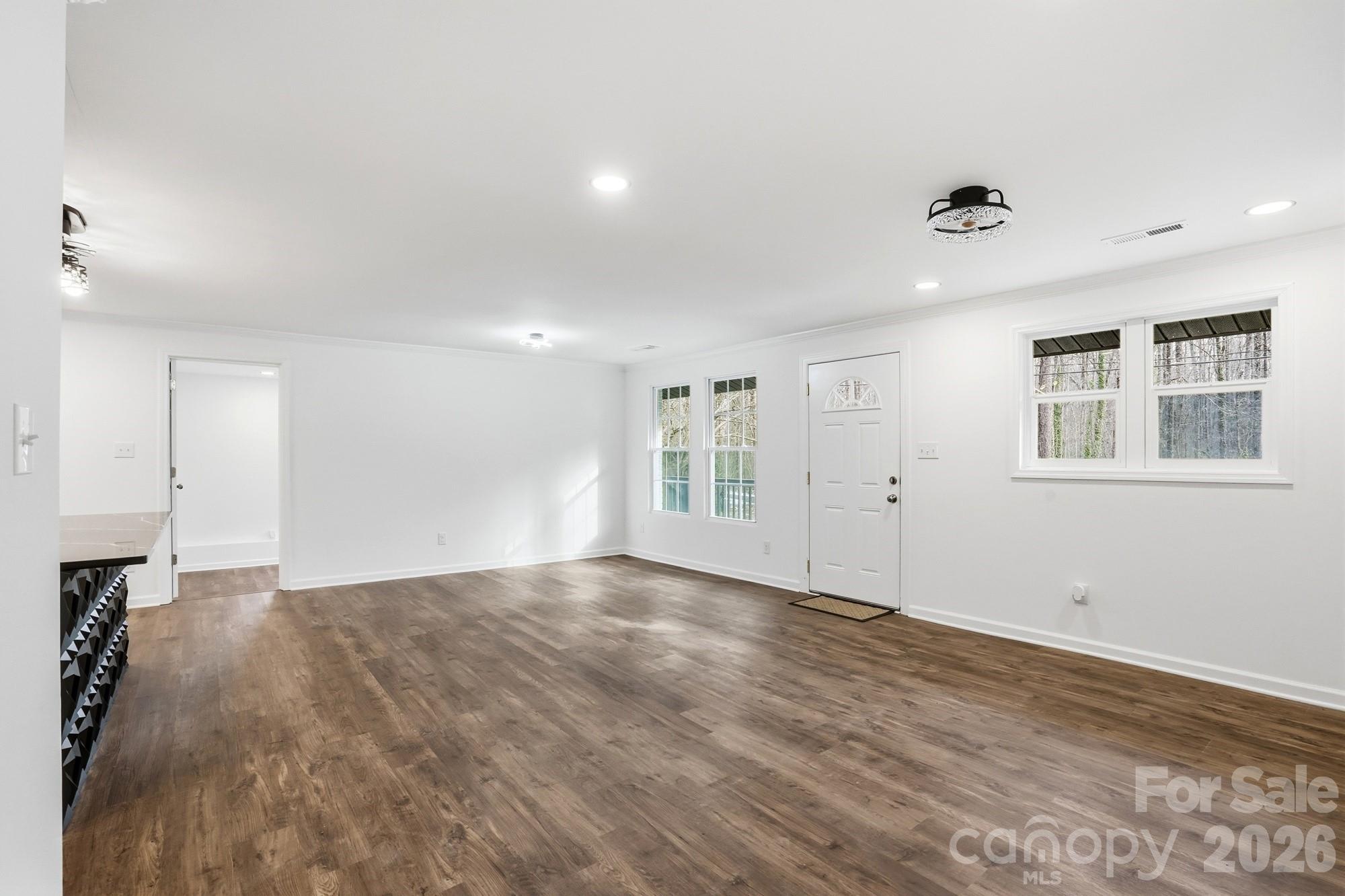 704 West Border Street Dallas, NC 28034 - Photo 21 of 48 a view of an empty room with a window