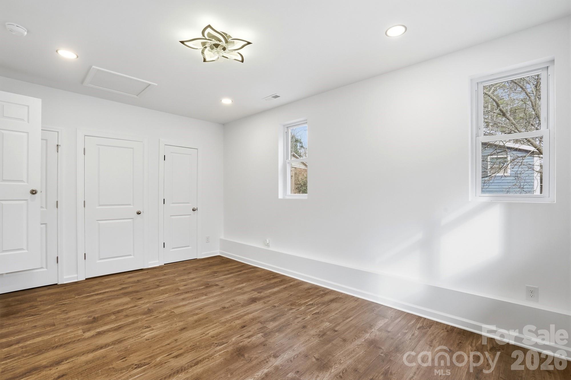 704 West Border Street Dallas, NC 28034 - Photo 29 of 48 wooden floor in an empty room with a window