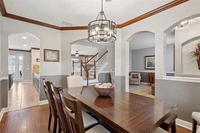 a kitchen with granite countertop a sink and stainless steel appliances