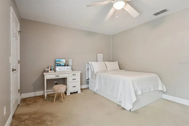 a bathroom with a bathtub a mirror a sink and a window