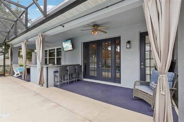 a front view of a house with a garden and yard