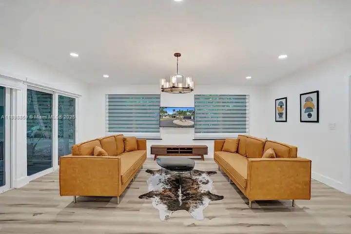 2100 Southwest 28th Way Fort Lauderdale, FL 33312 - Photo 13 of 40 a living room with furniture and a large window