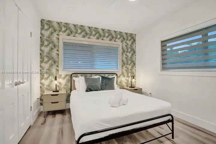 2100 Southwest 28th Way Fort Lauderdale, FL 33312 - Photo 28 of 40 a bed room with a bed and a window