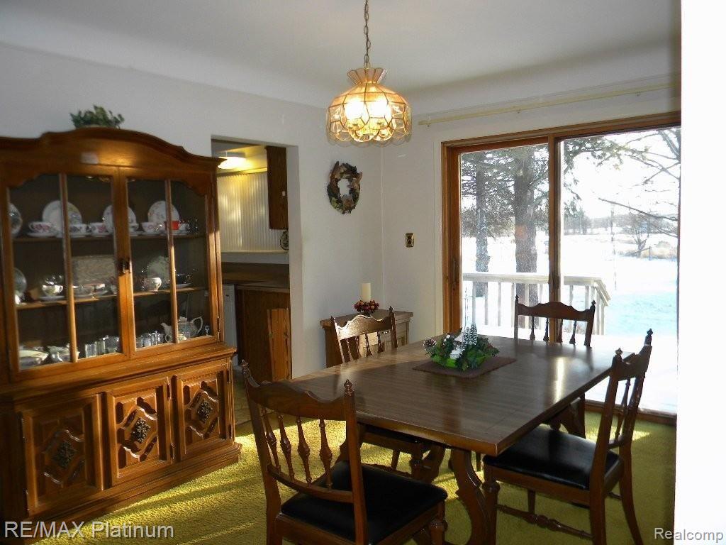 850 North Latson Road Howell, MI 48843 - Photo 10 of 25 DINING RM W/ A VIEW