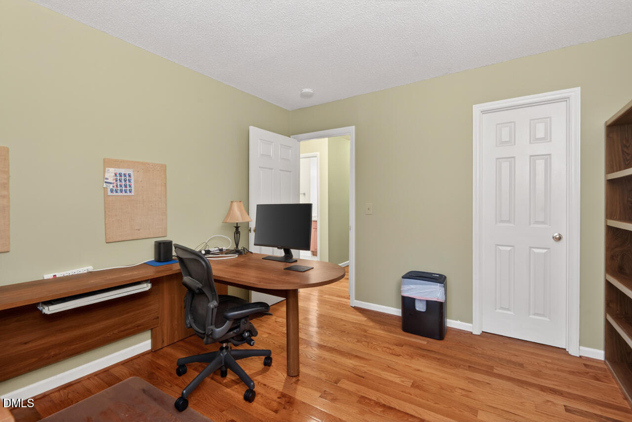3307 Coachman's Way Durham, NC 27705 - Photo 35 of 50 a view of a workspace with furniture and wooden floor