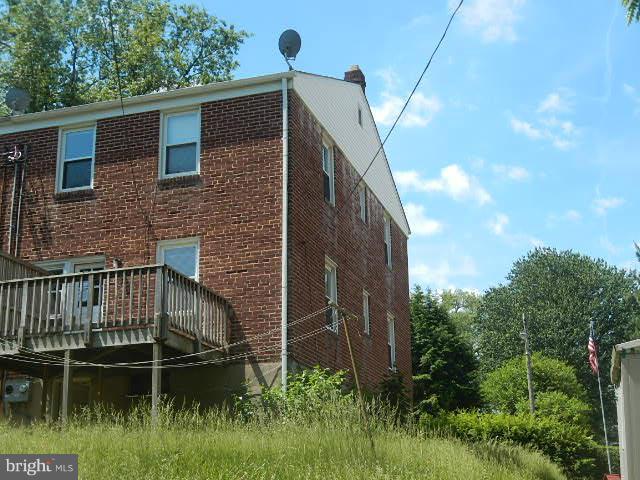 5715 Simmonds Avenue Baltimore, MD 21215 - Photo 2 of 12 a balcony with window in front of it