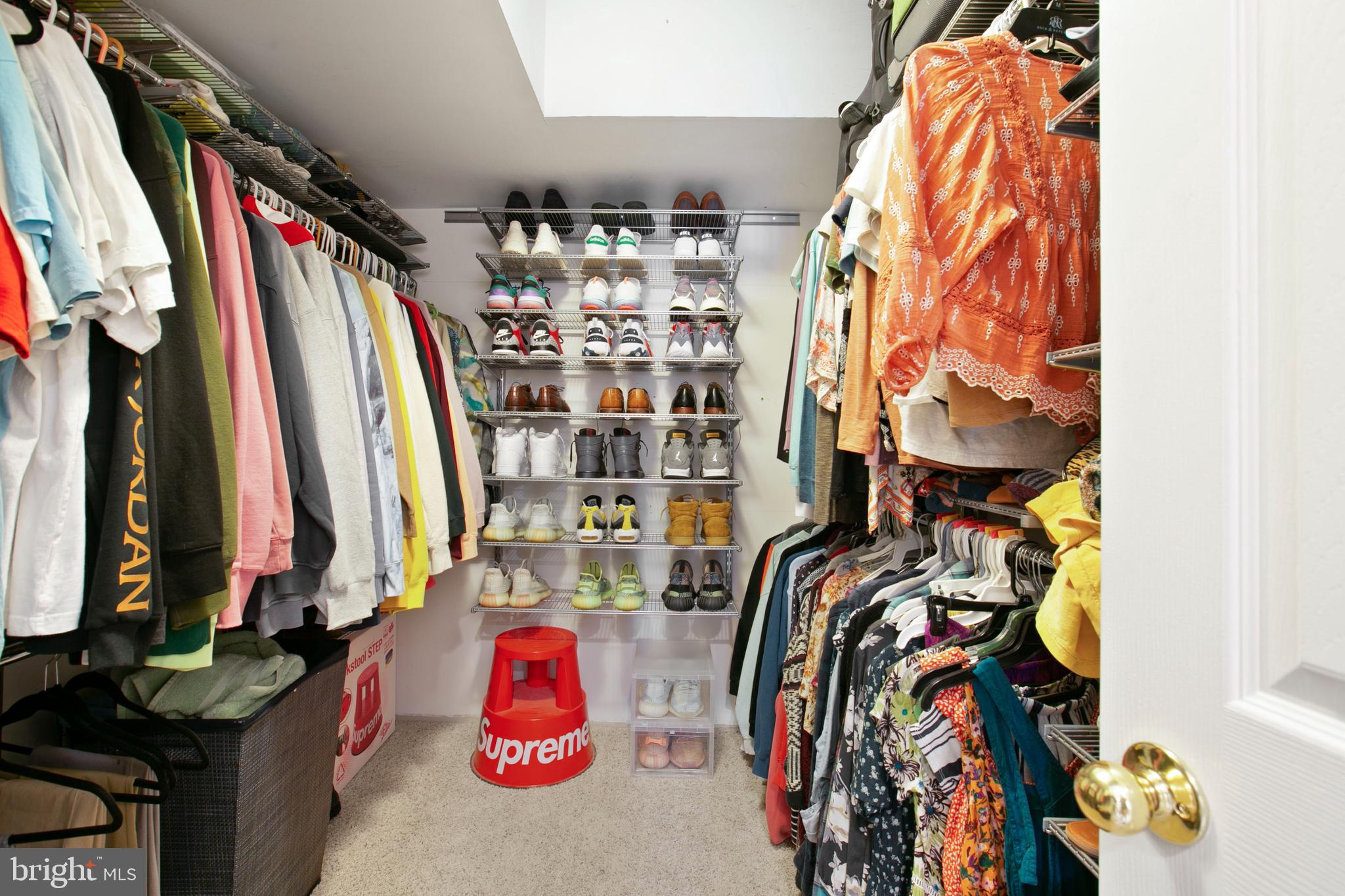 1230 Cooksie Street Baltimore, MD 21230 - Photo 25 of 41 a view of walk in closet with clothes and shoes
