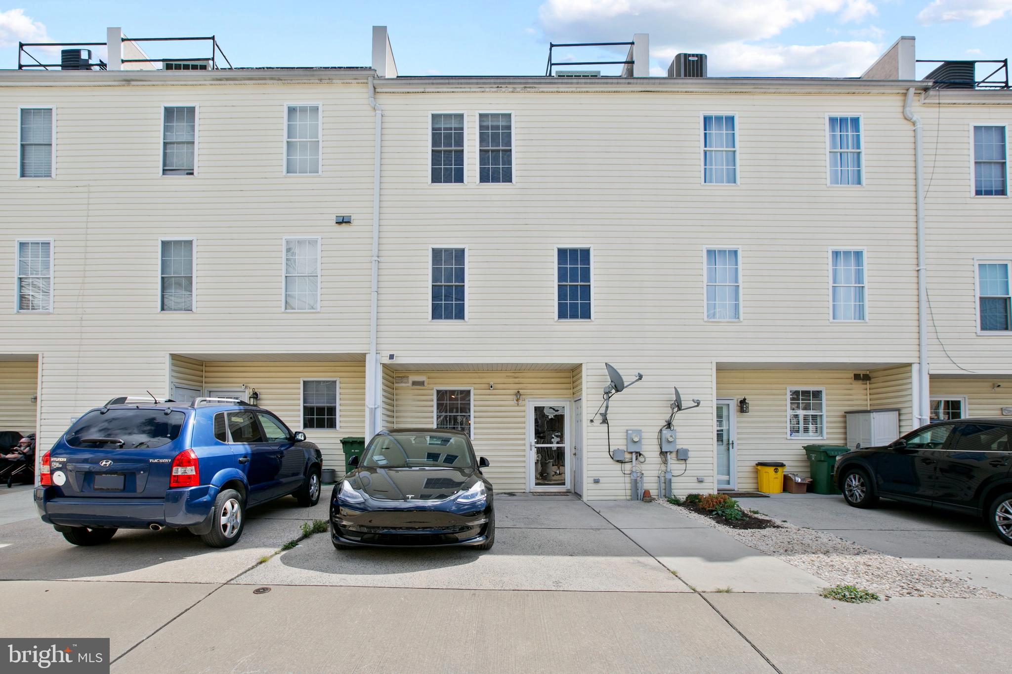 1230 Cooksie Street Baltimore, MD 21230 - Photo 41 of 41 a view of a cars park in front of a building
