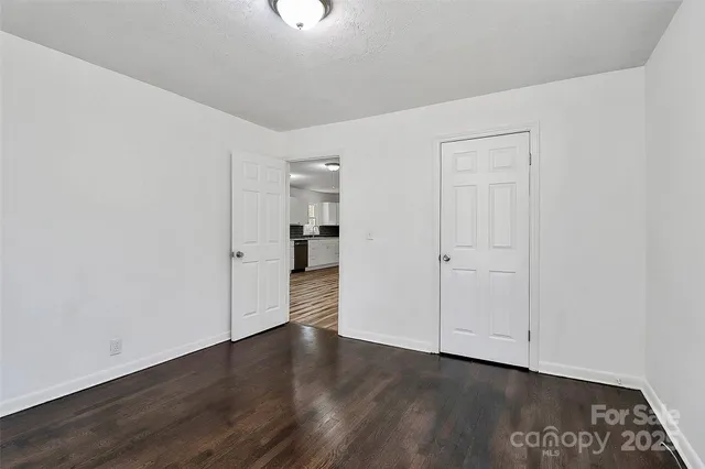 a view of a livingroom with wooden floor