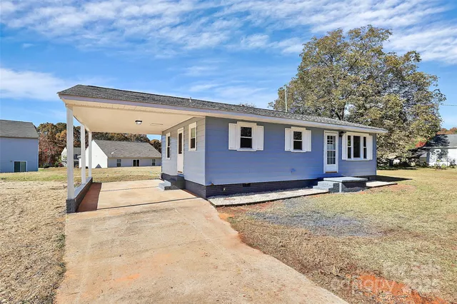 a view of a house with a patio
