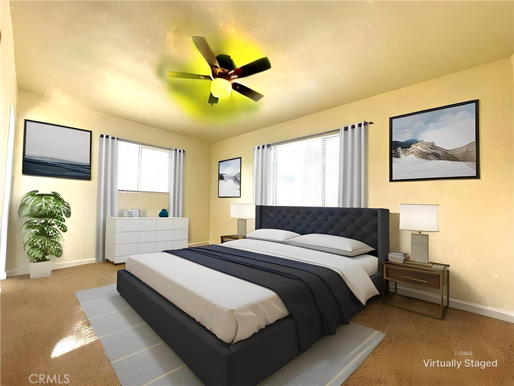 1500 West Alene Avenue Ridgecrest, CA 93555 - Photo 27 of 30 a bedroom with a bed and a painting on the wall