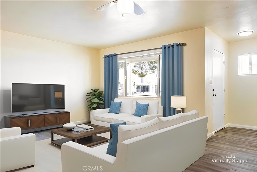 1500 West Alene Avenue Ridgecrest, CA 93555 - Photo 29 of 30 a living room with furniture and a flat screen tv
