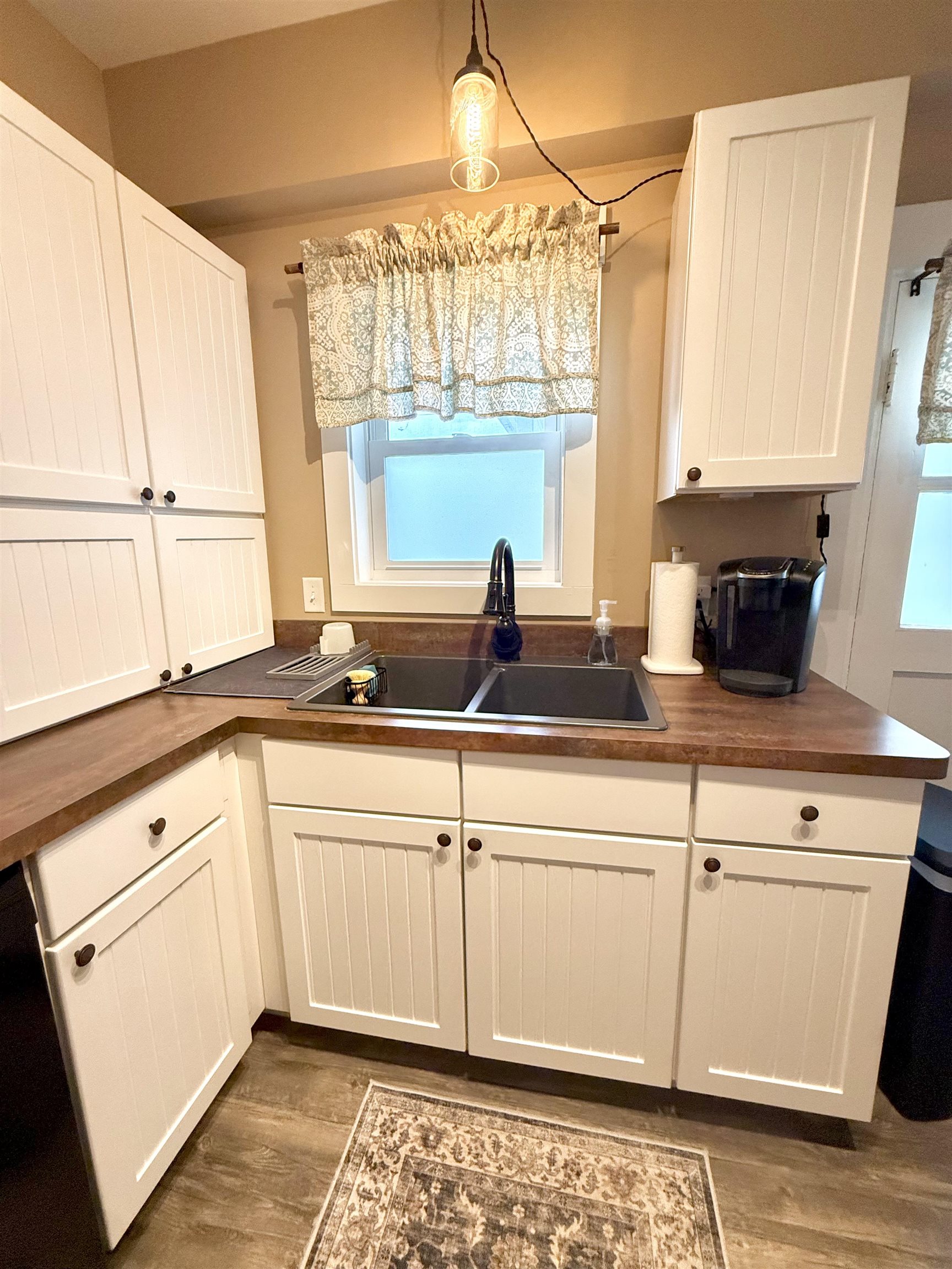 15385 Evergreen Valley Road Timberville, VA 22853 - Photo 8 of 44 a kitchen with a sink and cabinets