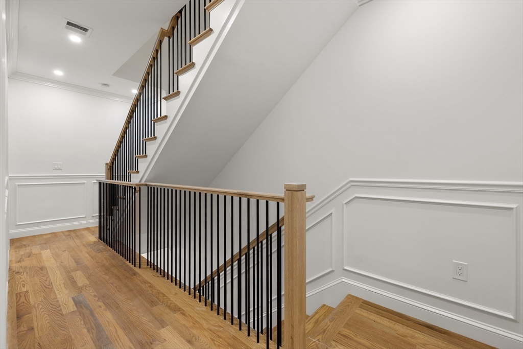 27 Coolidge Road, Unit 1 Boston, MA 02134 - Photo 13 of 41 a view of entryway with wooden floor
