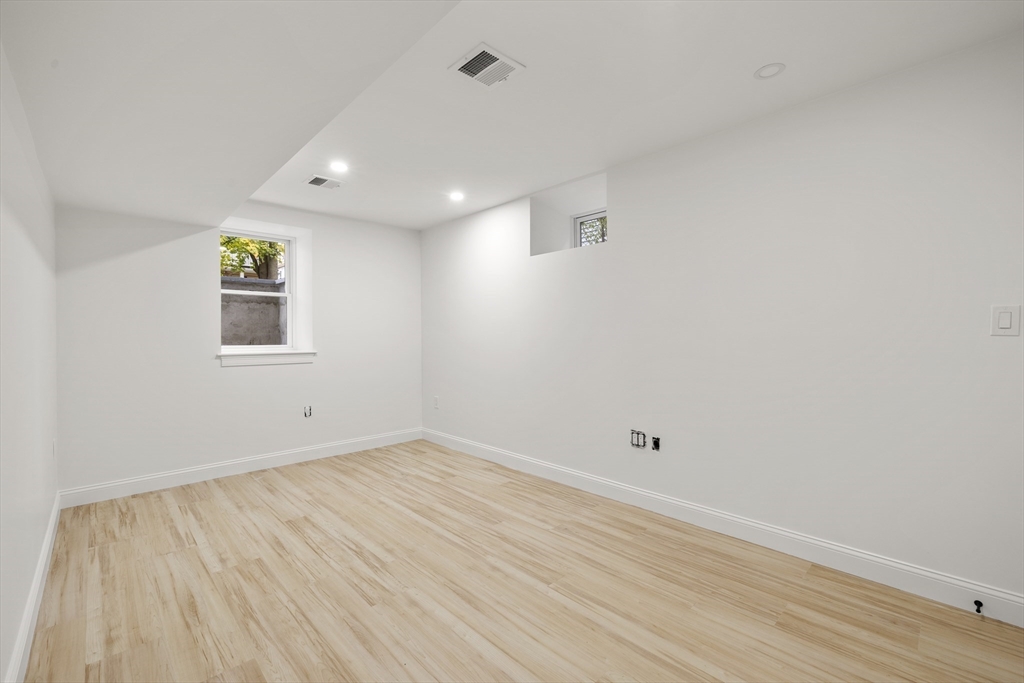 27 Coolidge Road, Unit 1 Boston, MA 02134 - Photo 32 of 41 wooden floor in a room