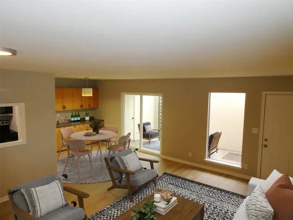 a living room with furniture and a window
