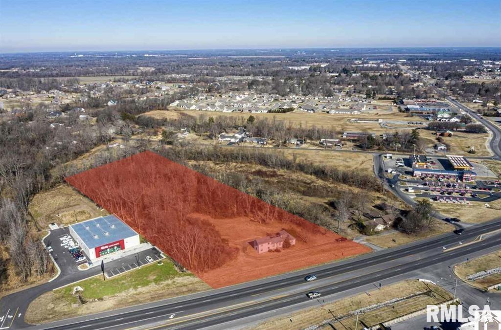 5269 Hinkleville Road Paducah, KY 42001 - Photo 2 of 21 an aerial view of residential houses with outdoor space