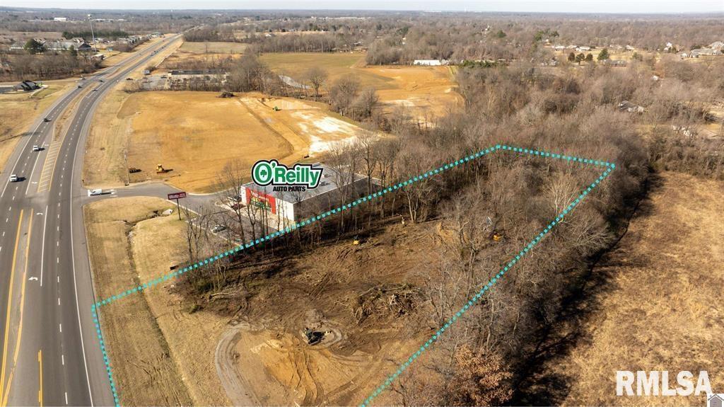 5269 Hinkleville Road Paducah, KY 42001 - Photo 7 of 21 an aerial view of residential houses with outdoor space