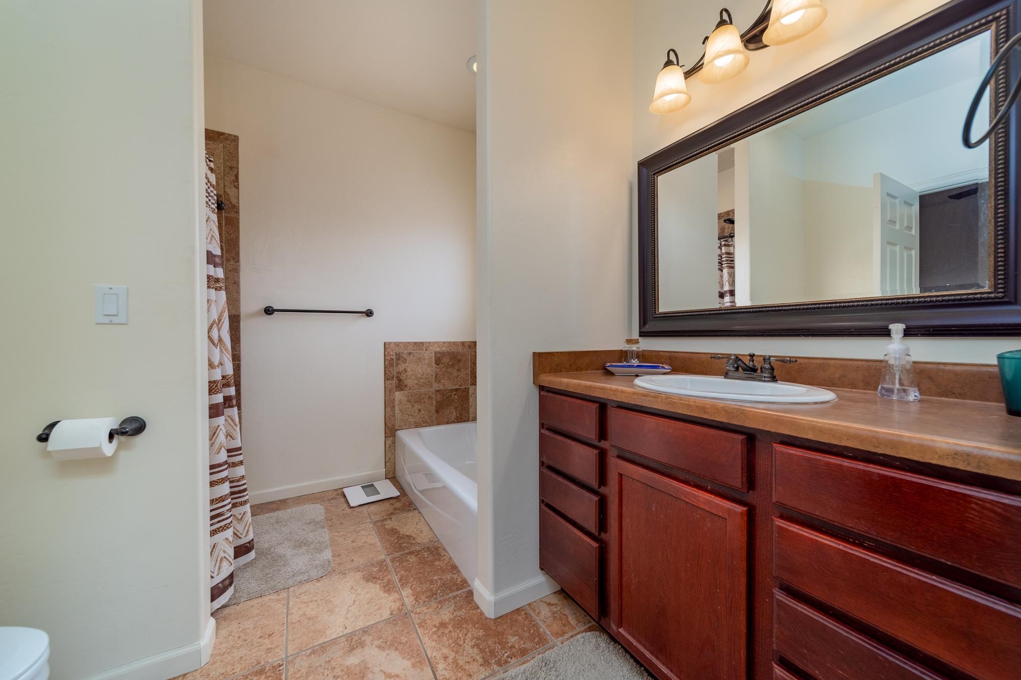 280 Gettysburg Street Grand Junction, CO 81503 - Photo 11 of 29 a spacious bathroom with a sink and a mirror