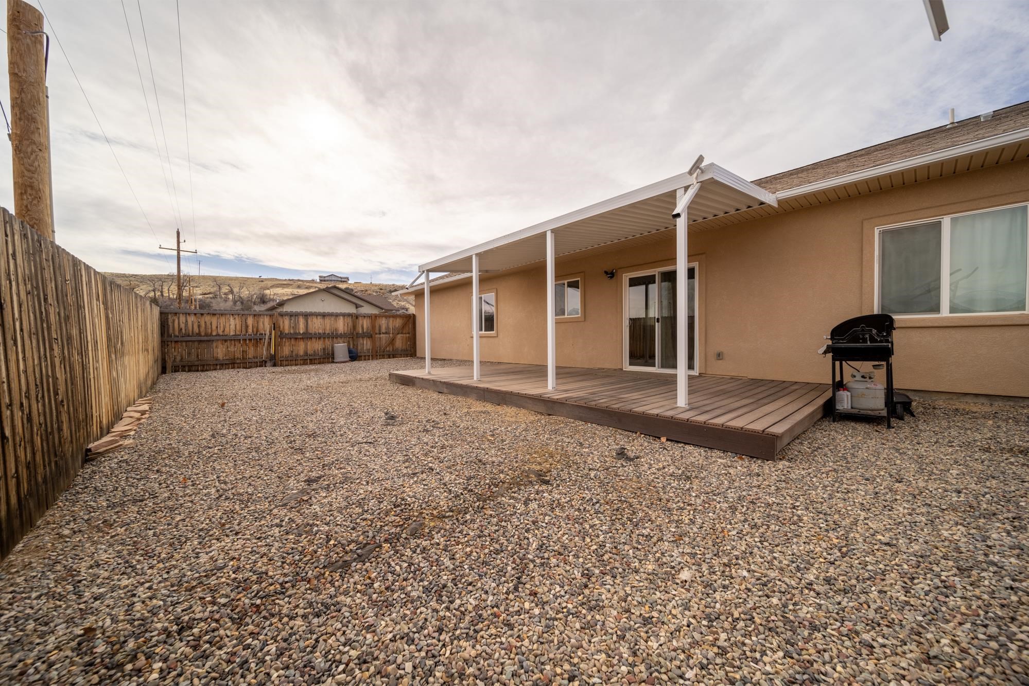 280 Gettysburg Street Grand Junction, CO 81503 - Photo 23 of 29 a backyard of a house with wooden fence