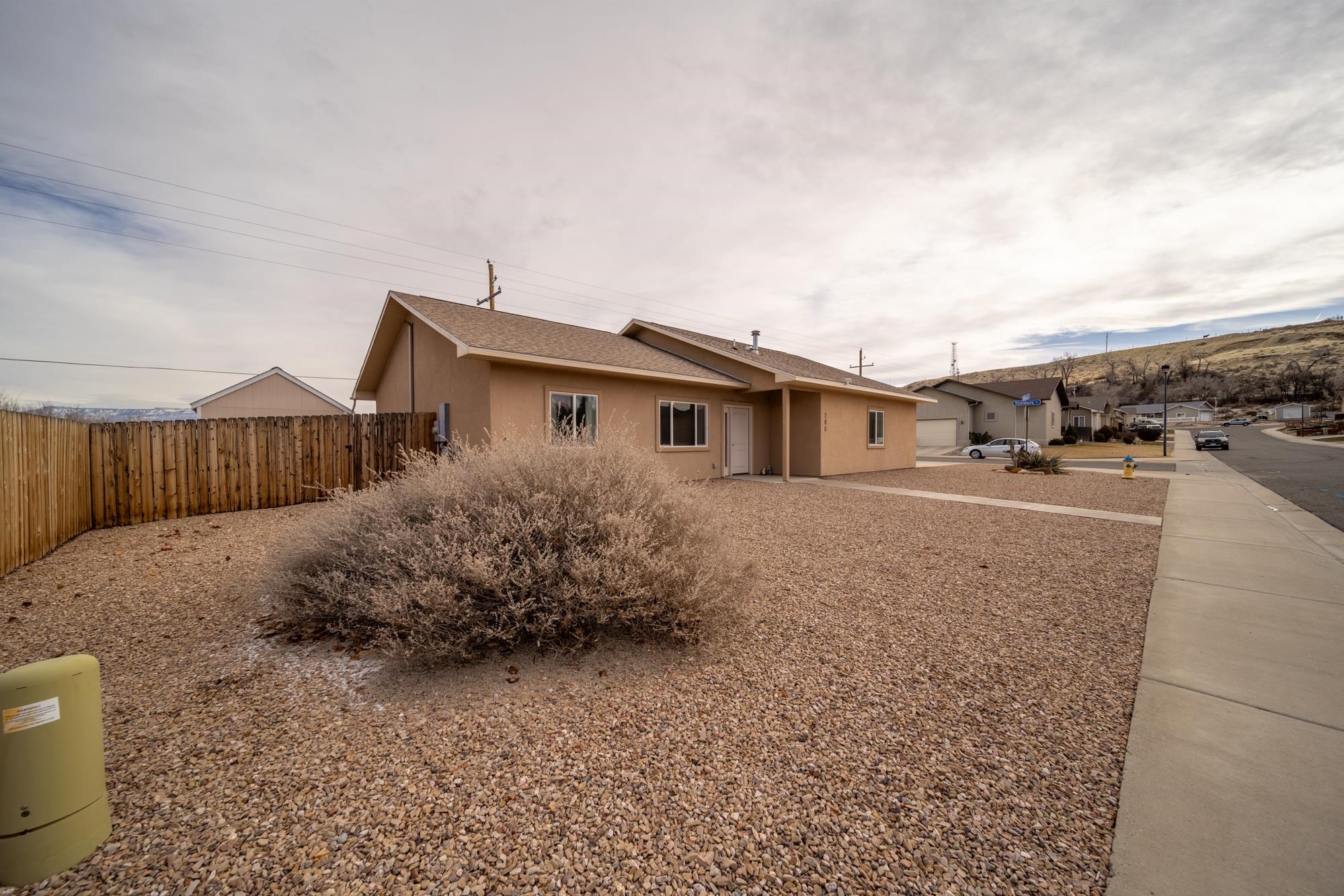 280 Gettysburg Street Grand Junction, CO 81503 - Photo 27 of 29 a view of a house with backyard and sitting area