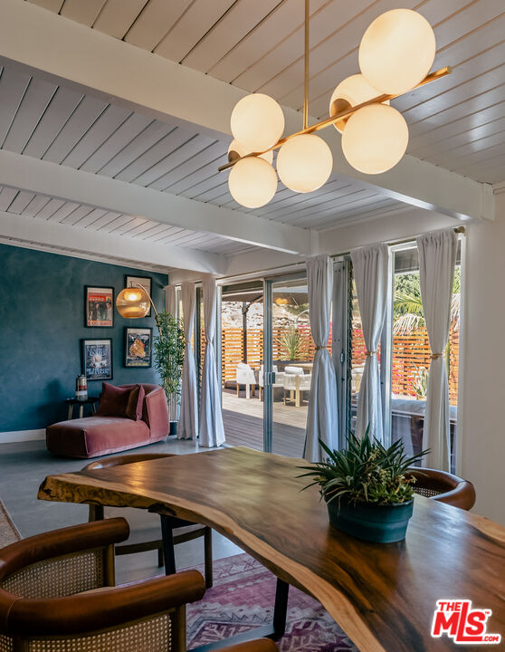 7211 Chelan Way Los Angeles, CA 90068 - Photo 12 of 38 a room with furniture and potted plant