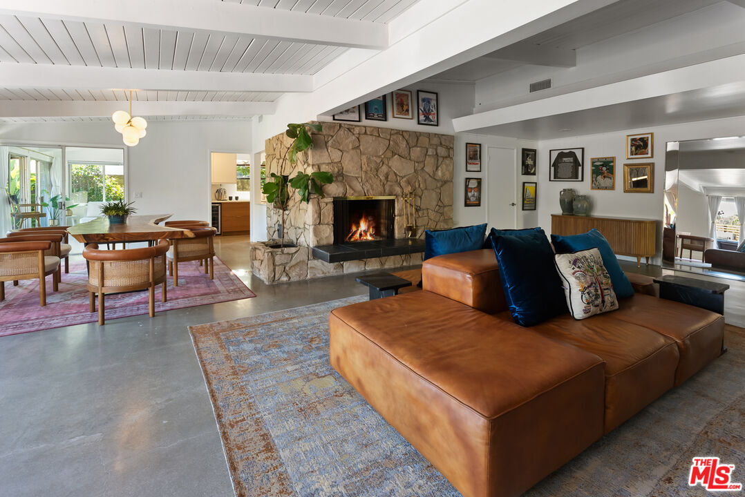7211 Chelan Way Los Angeles, CA 90068 - Photo 13 of 38 a living room with furniture and a fireplace