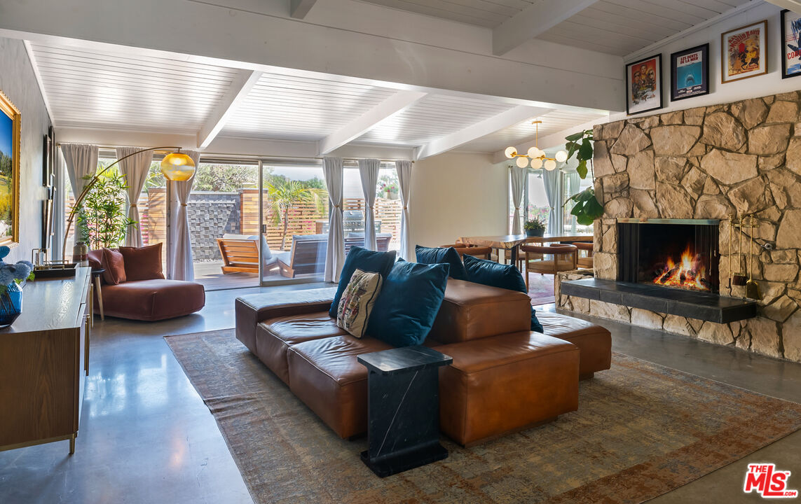 7211 Chelan Way Los Angeles, CA 90068 - Photo 2 of 38 a living room with furniture and a fireplace