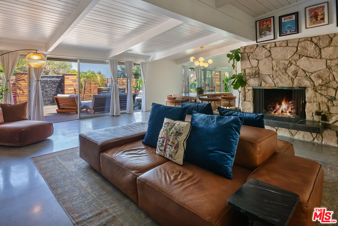 7211 Chelan Way Los Angeles, CA 90068 - Photo 8 of 38 a living room with furniture and a fireplace