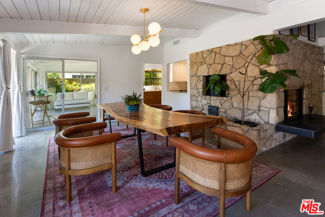 7211 Chelan Way Los Angeles, CA 90068 - Photo 10 of 38 a kitchen with a table and chairs
