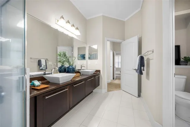 a dining hall with granite countertop a refrigerator and a stove