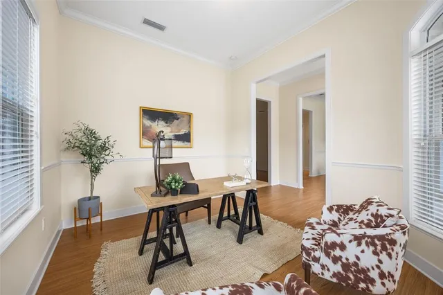 a workspace with furniture and window